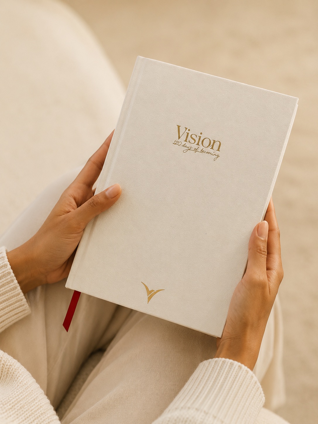 Holding the VisionRuya undated daily planner, 120 Days of Becoming