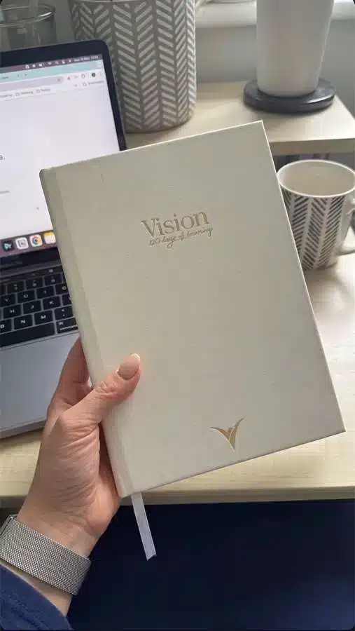 Customer holding the VisionRuya undated daily planner at home