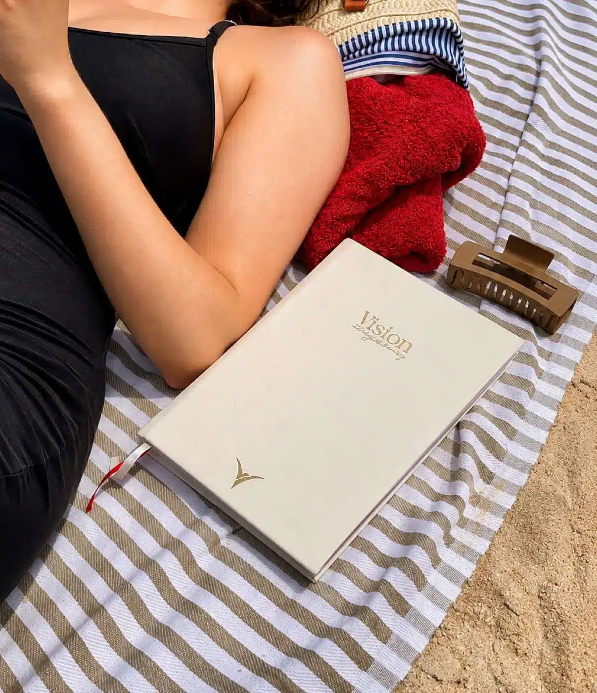 VisionRuya daily planner brought along on a beach day